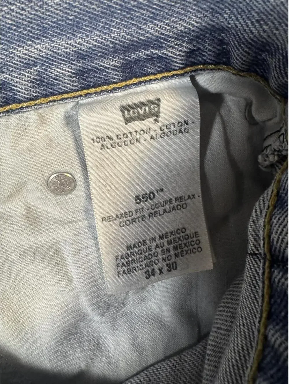 Vintage 90s Levi’s 550 Relaxed Fit Jeans 34x30 Light Wash Distressed Denim